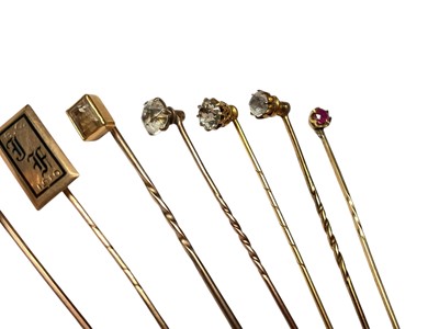 Lot 232 - Collection of nine Victorian and Edwardian gold and yellow metal gem set stick pins