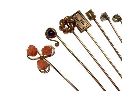 Lot 232 - Collection of nine Victorian and Edwardian gold and yellow metal gem set stick pins