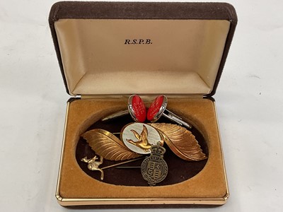 Lot 234 - Two Victorian silver mounted pin cushion jewellery boxes both with embossed scroll decoration, together with a smaller 1920s silver mounted pin cushion trinket box