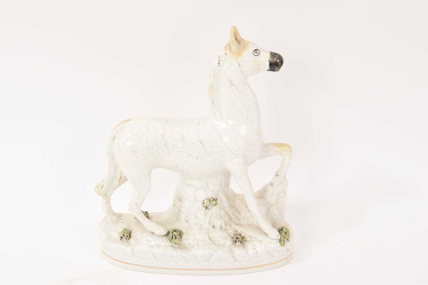 Lot 30 - 19th century Staffordshire pottery zebra