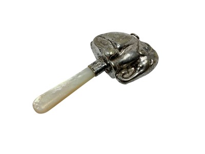 Lot 572 - White metal and mop elephant rattle/teether
