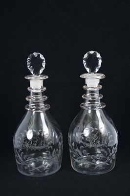 Lot 283 - Pair of George III glass triple ring neck decanters and stoppers