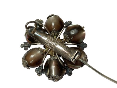 Lot 237 - Chinese silver and mother of pearl flower head brooch