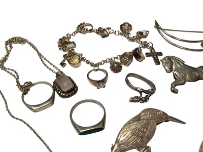 Lot 239 - Group of silver and white metal jewellery to include rings, pair of cufflinks, brooches, pendant necklaces and a contemporary charm bracelet