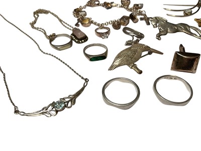 Lot 239 - Group of silver and white metal jewellery to include rings, pair of cufflinks, brooches, pendant necklaces and a contemporary charm bracelet