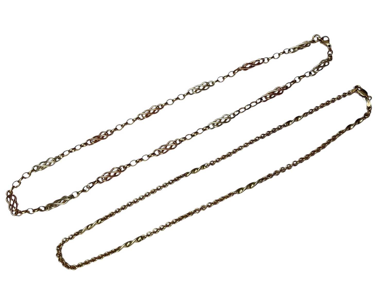 Lot 244 - Two 9ct yellow and white gold fancy link chains