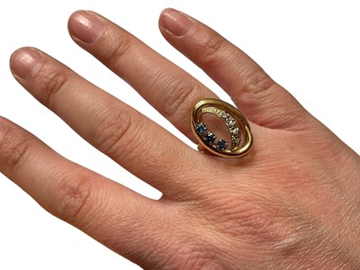 Lot 248 - Sapphire and diamond abstract oval open work design ring