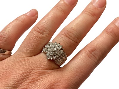 Lot 254 - Diamond cluster ring with a central pear shaped cluster of brilliant cut diamonds
