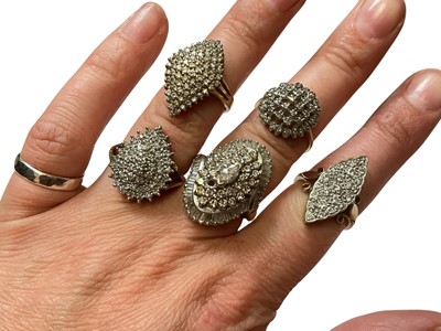 Lot 260 - Five 9ct gold diamond set cluster rings