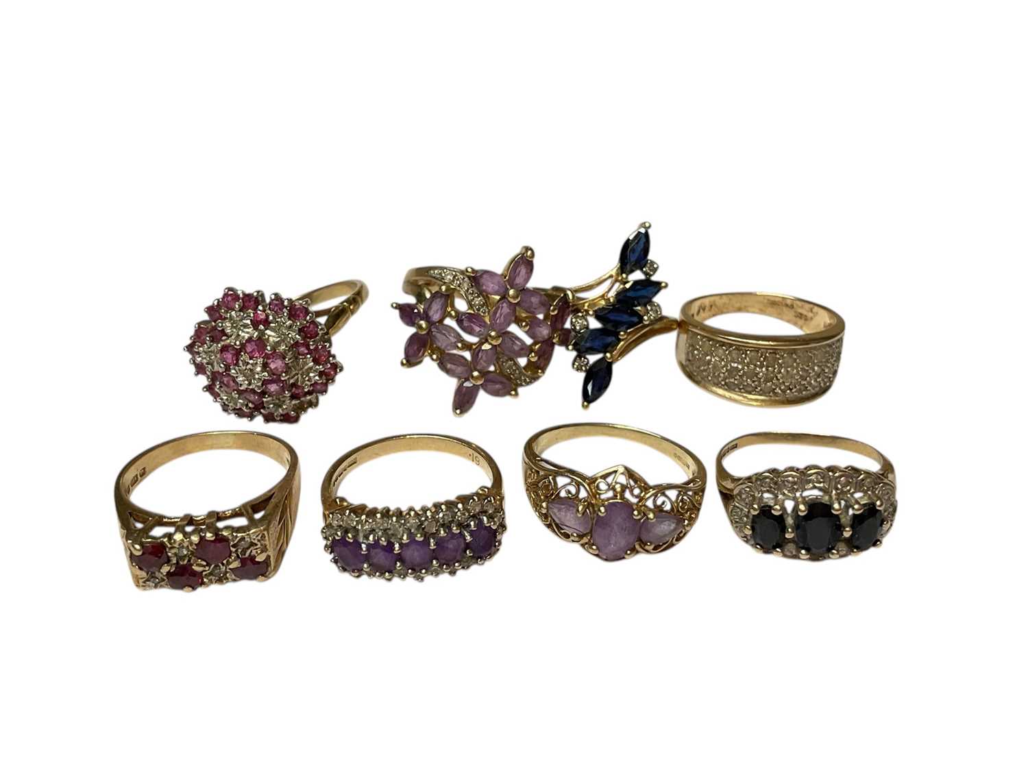 Lot 262 - Eight 9ct gold diamond and gem set dress rings