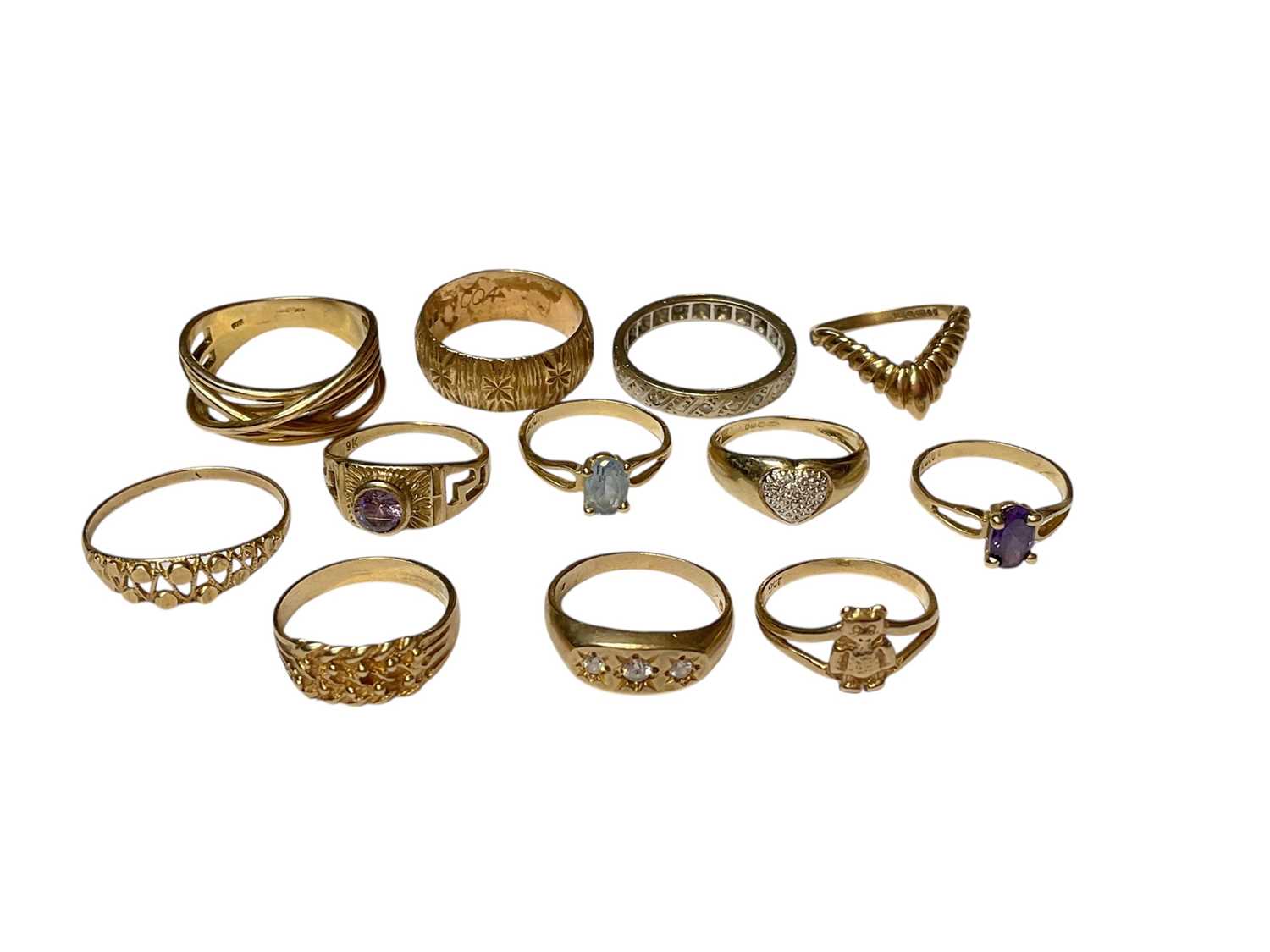 Lot 264 - Twelve 9ct gold and yellow metal rings including some gem set