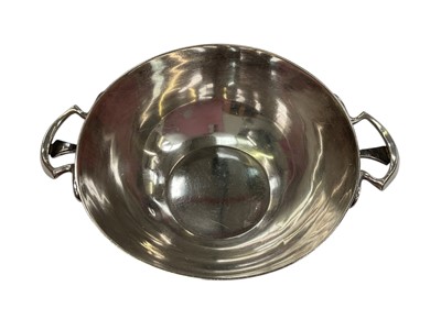 Lot 266 - Edwardian silver sugar bowl, (London 1906), maker Charles Edwards, 10.5cm in diameter (excluding handles), all at 6ozs.