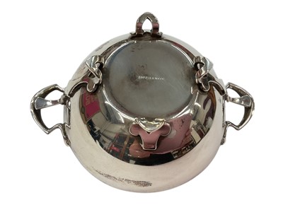 Lot 266 - Edwardian silver sugar bowl, (London 1906), maker Charles Edwards, 10.5cm in diameter (excluding handles), all at 6ozs.