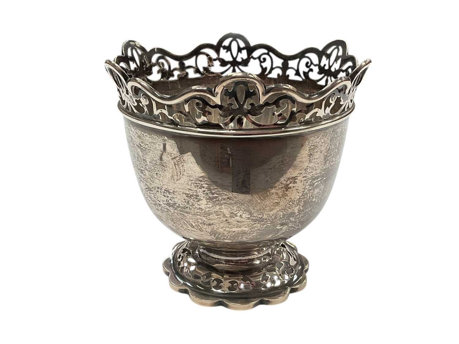 Lot 269 - Edwardian silver rose bowl with pierced monteith style border, raised on a pierced pedestal foot, (Sheffield 1901), maker William Hutton & Sons, 13.3cm in heigh, all at 9ozs.