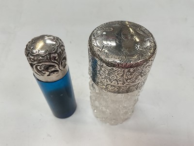 Lot 272 - Late Victorian cut glass dish with applied silver mount, (London 1899), maker William Comyns, together with two silver mounted cut glass scent bottles (various dates and makers).