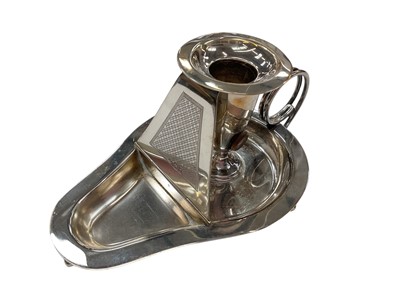 Lot 273 - Unusual late Victorian silver chamberstick with hinged compartment opening to reveal a match striker, (London 1899), maker WCJL, 16.7cm in length, all at approximately 8ozs