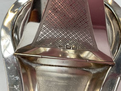 Lot 273 - Unusual late Victorian silver chamberstick with hinged compartment opening to reveal a match striker, (London 1899), maker WCJL, 16.7cm in length, all at approximately 8ozs