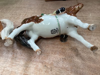 Lot 1114 - Beswick girl on a palomino horse, 13.5cm, and boy on a skewbald pony, 14cm (2)