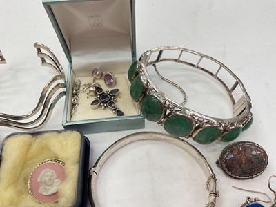 Lot 281 - Group of silver and white metal jewellery including bangles, two Scottish brooches, other brooches, locket pendant on chain, semi-precious gem stone jewellery etc