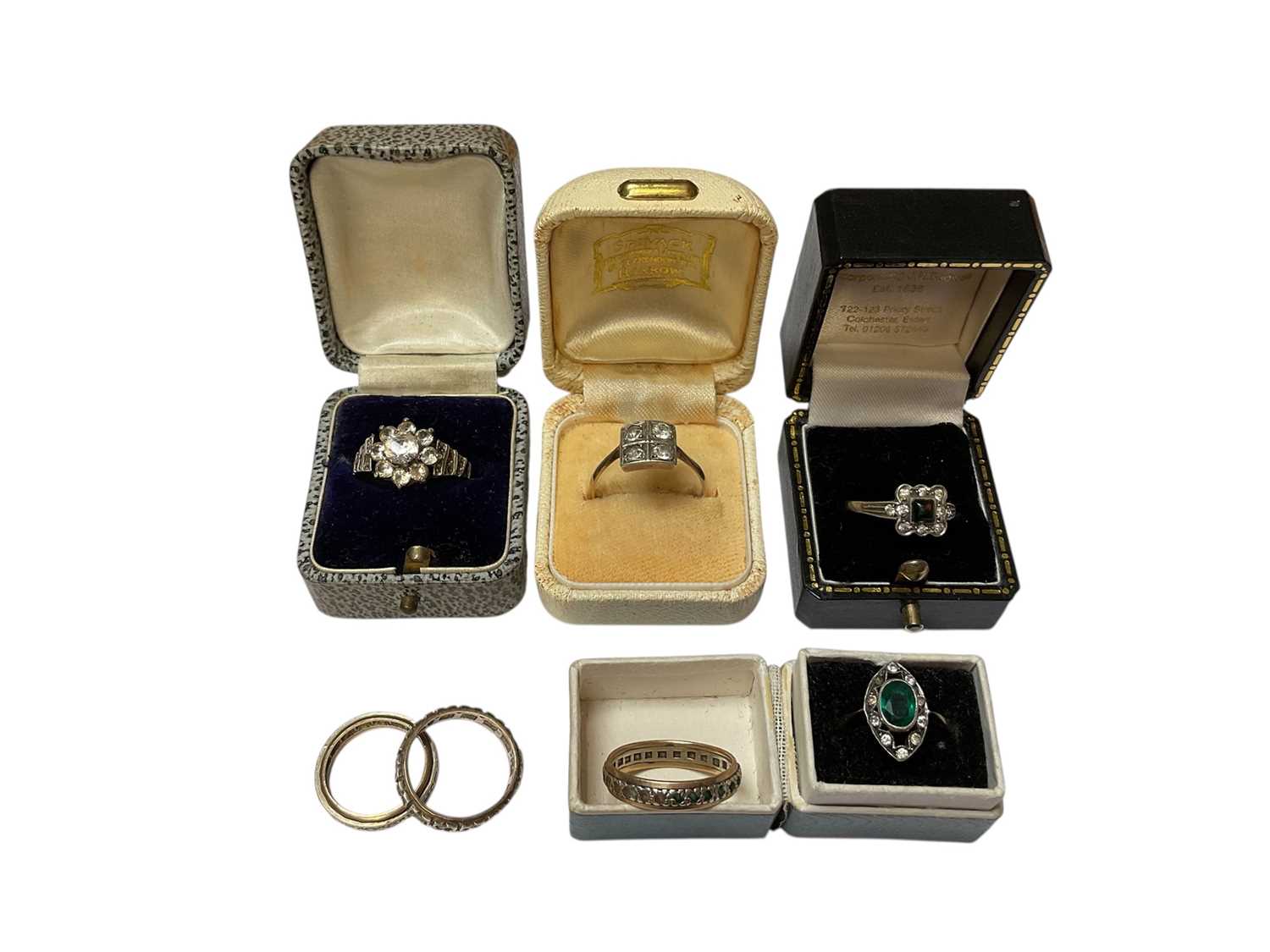 Lot 285 - Seven 9ct gold and silver paste set dress rings