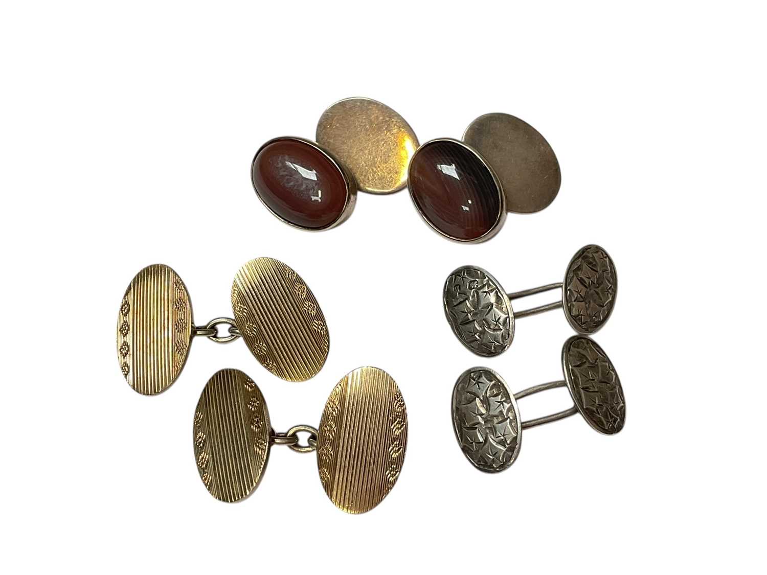 Lot 286 - Pair of silver and oval polished agate cufflinks, pair of Victorian silver cufflinks with ivy leaf decoration and one other pair of 9ct gold on silver cufflinks