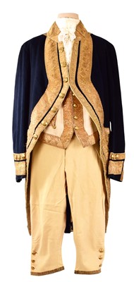 Lot 60 - Rare Edwardian / King George V Royal Footman's State Livery by Price Whittaker & Co, London compring black tailcoat with ornate gold bullion work lace decoration, gilt brass buttons decorate...