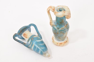Lot 1101 - Pair of Eastern glass vessels in antique wooden box with label