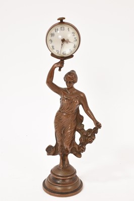 Lot 640 - Small lacquered bronze sculptural clock