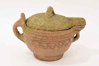 Lot 82 - Antique earthenware jug and cover with patterned decoration, possibly North African
