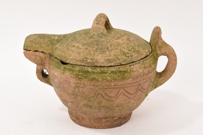Lot 82 - Antique earthenware jug and cover with patterned decoration, possibly North African