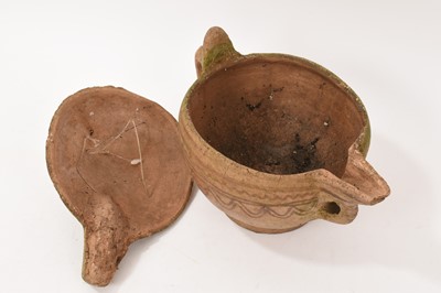 Lot 82 - Antique earthenware jug and cover with patterned decoration, possibly North African