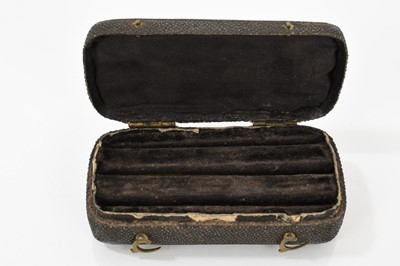 Lot 607 - George III ring box for three rows of rings, covered in shagreen with original brass hinges and catches, 10cm.