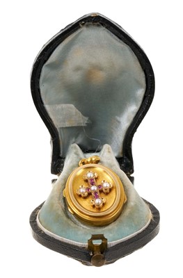 Lot 602 - 19th century French gold locket with a cabochon ruby and pearl cross to the front, in original fitted box. Locket 35mm height.