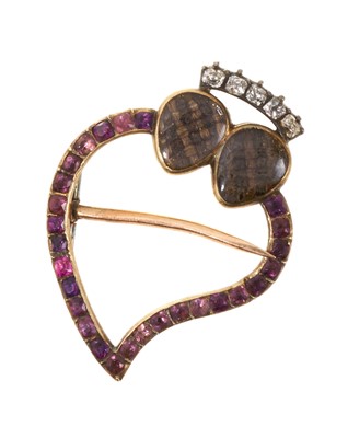 Lot 604 - George III diamond and amethyst 'witch's heart' brooch with a two finely woven hairwork glazed compartments in a twin heart design surmounted with stylised diamond crown, the amethyst heart wit...