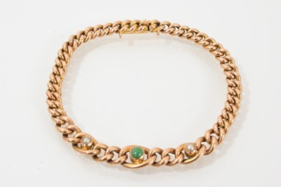 Lot 609 - Late Victorian gold curb link bracelet, the central section with a turquoise cabochon and two pearls, clasp stamped '15', length 18.5cm.