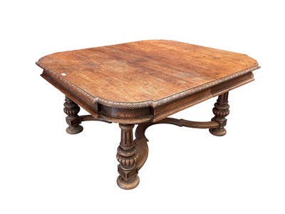 Lot 1520 - Very large late 19th / early 20th century French oak extending table with leaves