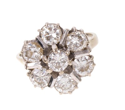 Lot 700 - Diamond cluster ring with a flower head of seven brilliant cut diamonds estimated to weigh approximately 2cts in total, in 18ct white gold setting, ring size L