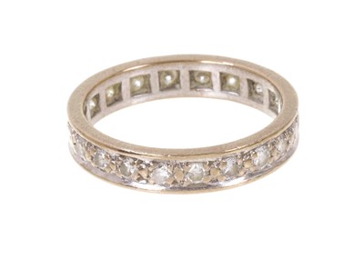 Lot 704 - Diamond eternity ring with a full band of brilliant cut diamonds in 18ct white gold setting, ring size K.