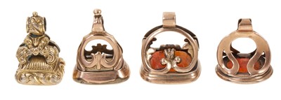 Lot 615 - Four Regency/19th century yellow metal and hardstone seals (4)