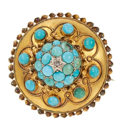 Lot 619 - Victorian turquoise and diamond gold target brooch, the circular domed plaque with applied decoration. Marked 15ct. Diameter 35mm.