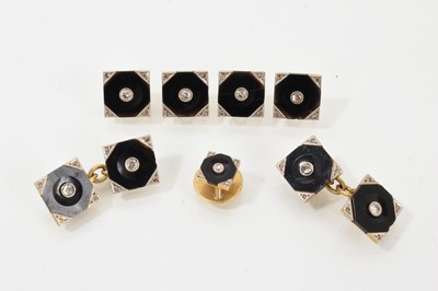 Lot 624 - Set of Art Deco diamond and black onyx cufflinks and studs, each with a square panel centred with an old cut diamond on black onyx ground with diamond corners, set in 18ct gold.