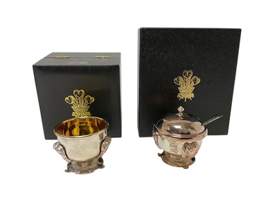 Lot 91 - H.R.H. Prince Charles The Prince of Wales (now King Charles III), presentation silver plated mustard pot and salt with Prince of Wales feather decoration in fitted boxes with P.O.W. cyphers to l...
