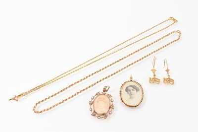 Lot 673 - Two Edwardian gold portrait lockets, gold rope twist chain, one other chain and a pair of Egyptian gold earrings