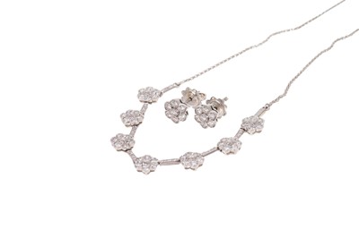 Lot 671 - Diamond necklace and earrings