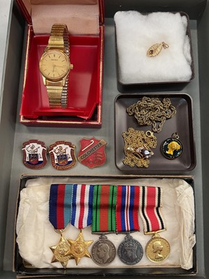 Lot 1172 - WWII miniature medal group, two Dunkirk Veterans Association enamel badges, Colchester enamel badge, Sekonda wristwatch, synthetic pendant and two gold plated chains etc