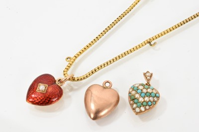 Lot 649 - Victorian gold and enamel heart shape pendant with a central seed pearl on red guilloché enamel ground, engraved '15ct &18ct', length 22mm, on a Victorian gold snake link chain, 40cm.