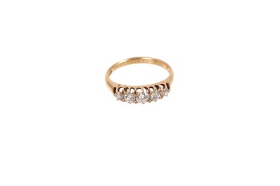 Lot 658 - Victorian diamond five stone ring with five graduated old cut diamonds in gold claw setting on tapered gold shank. Estimated total diamond weight approximately 0.75cts. Hallmarked Birmingham 187...