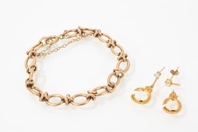 Lot 737 - Pair of diamond stud earrings in 18ct gold yellow metal setting, each with a suspended oval mount below (both broken), together with 9ct gold oval link bracelet