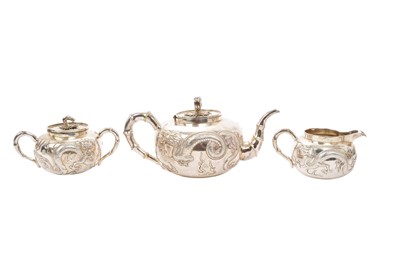 Lot 566 - Chinese silver three piece teaset