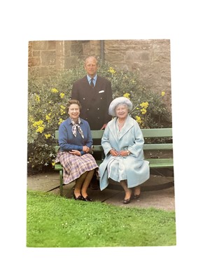 Lot 129 - H.M. Queen Elizabeth II and H.R.H. The Duke of Edinburgh signed 1985 Christmas card with photograph of the Royal couple with The Queen Mother signed ' Elizabeth R 1985 Philip' Provenance: sent to...